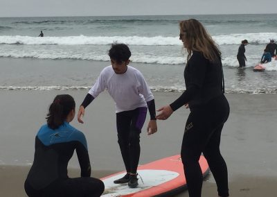 Project Surf Camp - Student Learning to Balance on Surf Board