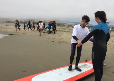 Project Surf Camp - Student on Surf Board