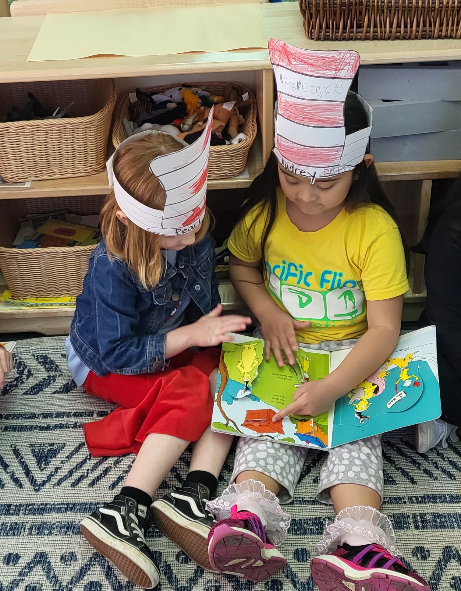Preschool kids reading Dr. Seuss